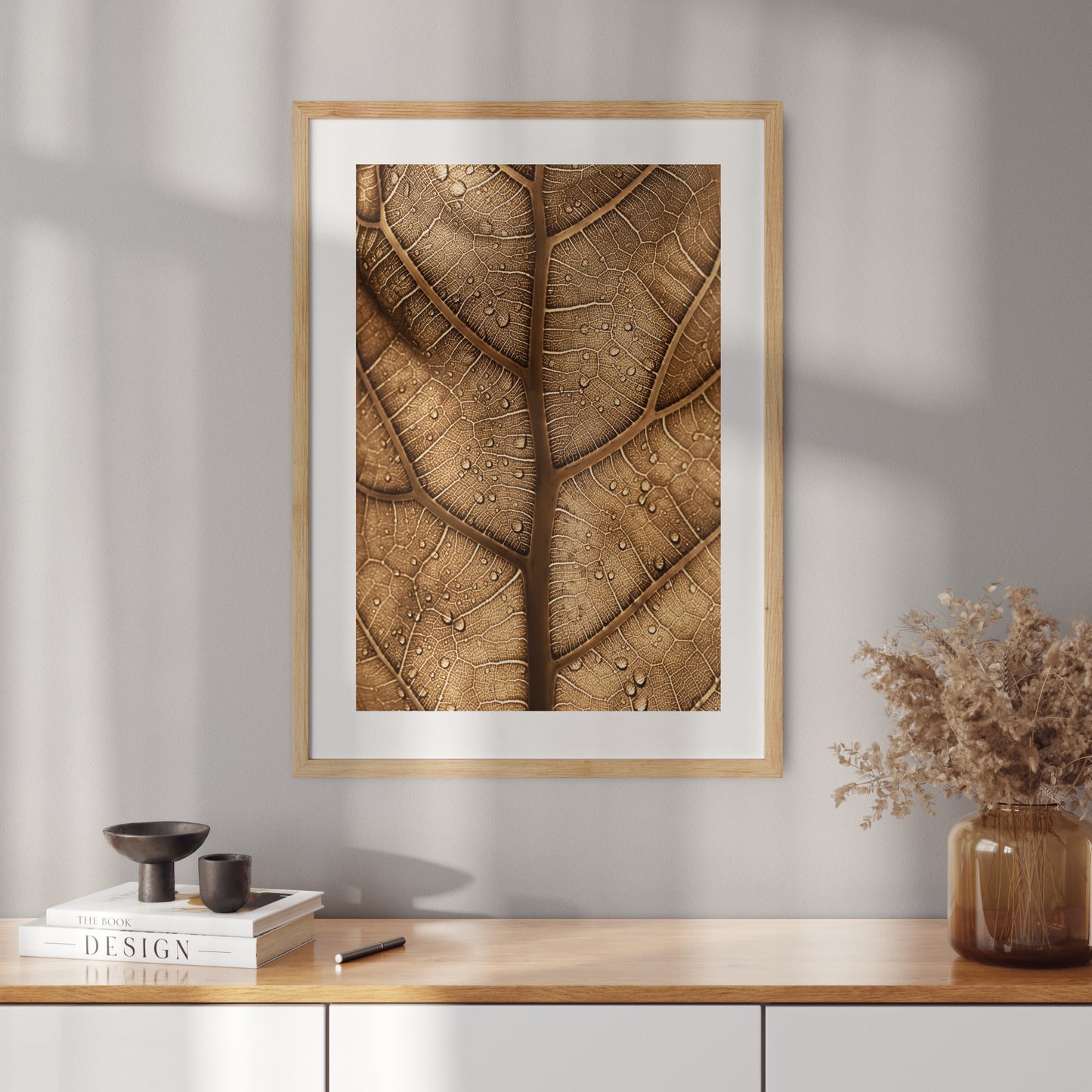 Poster with a photo of a brown leaf