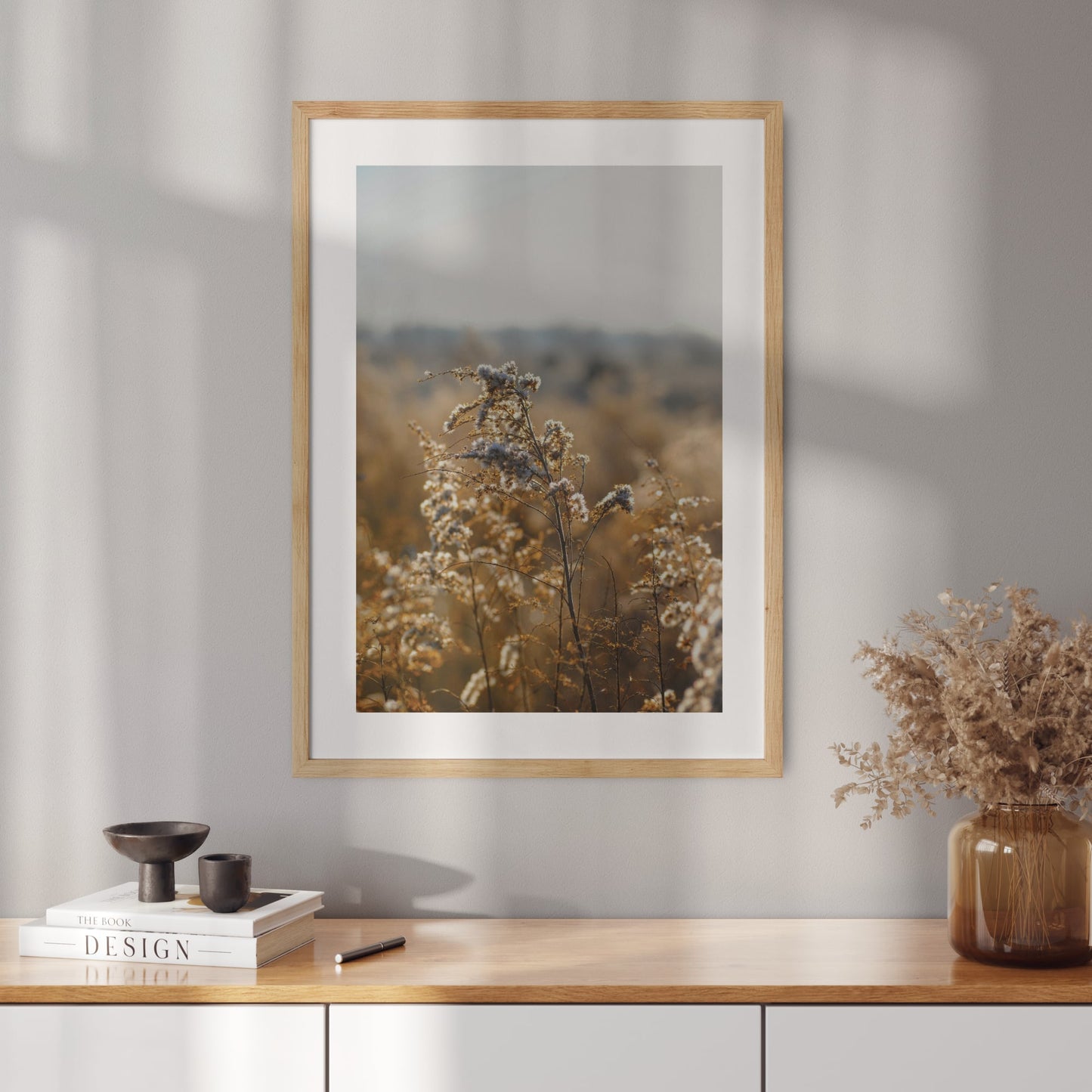 Poster with a photo of golden meadow flowers