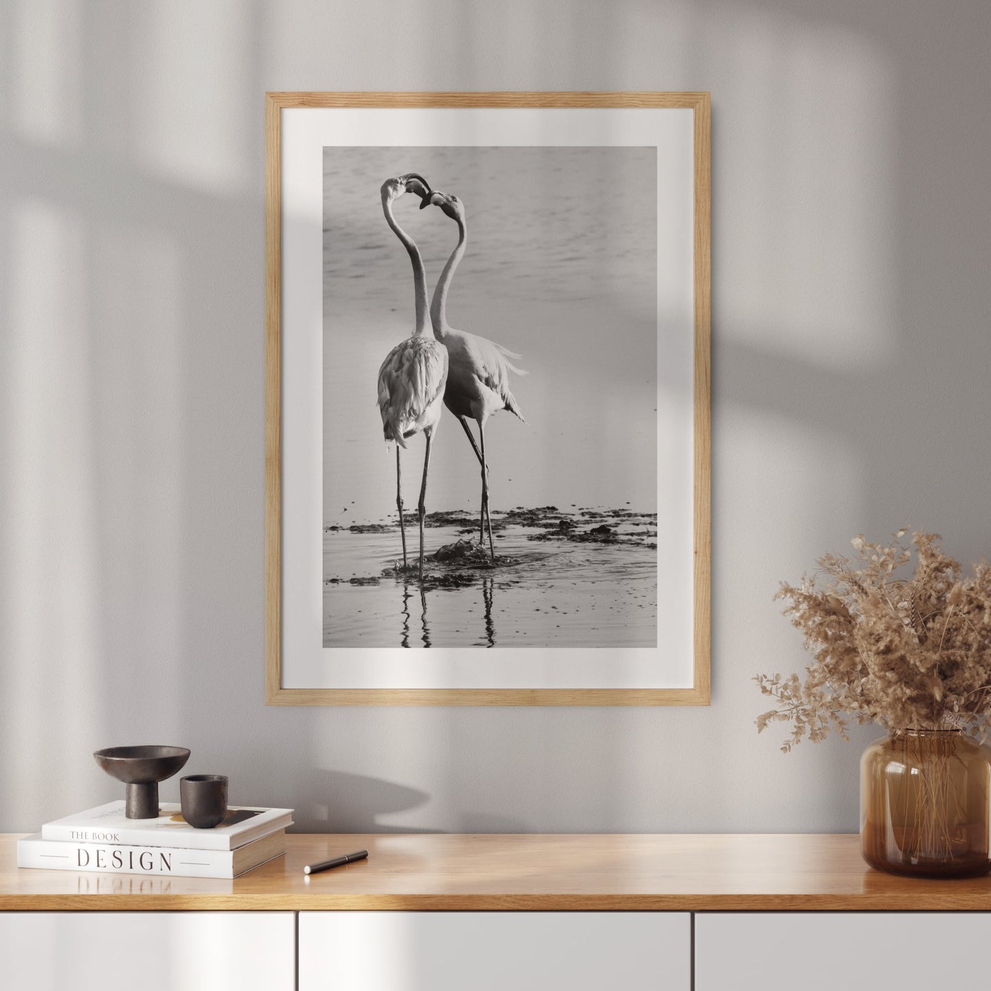 Poster with a photo of two flamingos