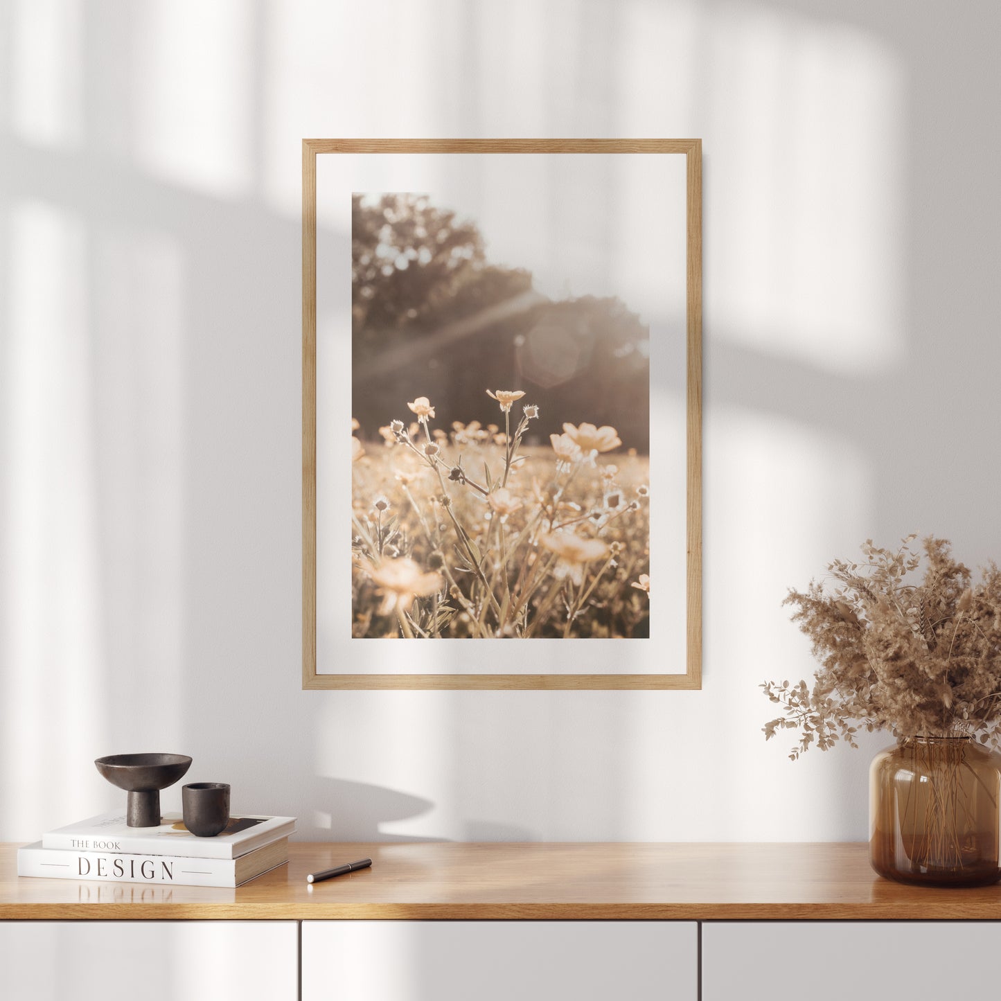 Boho poster with a photo of meadow flowers at sunset